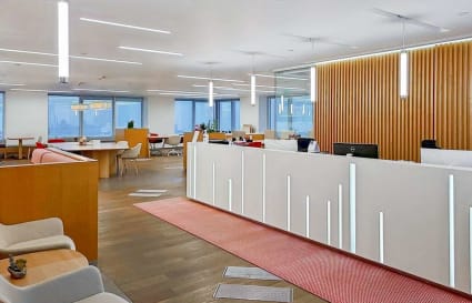 Modern coworking space in Queen's Road Central with open seating and stylish design.