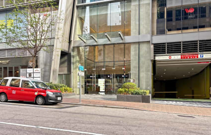 Modern coworking space on Observatory Road with sleek glass façade and convenient street access.