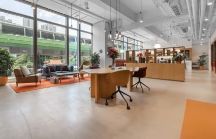 Modern coworking space with open layout, natural light, and stylish furnishings on Wong Chuk Hang Road.