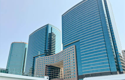 Modern coworking space in a sleek Canton Road high-rise for dynamic professionals.