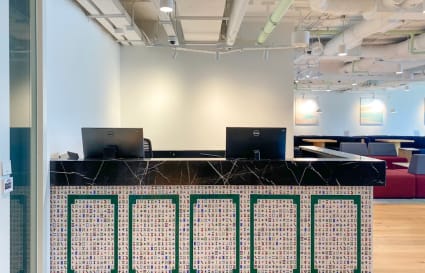 Welcoming reception area with modern design, ideal for dynamic coworking on Canton Road.