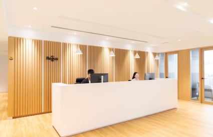Bright reception area in Harbour Road coworking space with modern design and welcoming staff.