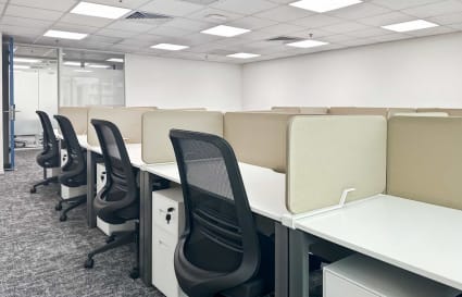 Modern coworking space with ergonomic chairs and private workstations on Nathan Road.