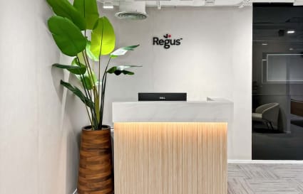 Modern reception area with sleek design and welcoming ambiance in a Canton Road coworking space.