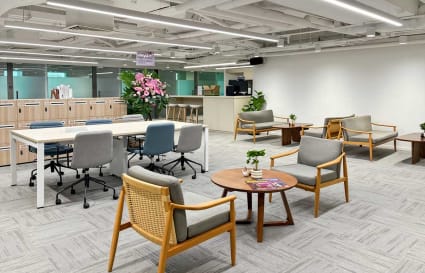 Modern coworking space with versatile seating, natural light, and collaborative areas on Canton Road.