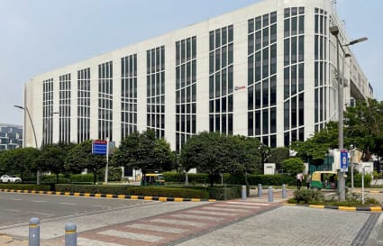 Modern coworking space in Delhi with ample natural light and a sleek exterior design.
