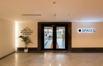 Welcome to a modern coworking space with sleek design and inspiring ambiance for creativity.