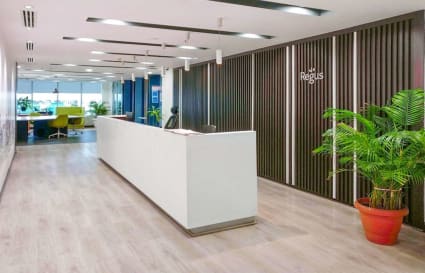 Sleek coworking space in Gurugram featuring modern decor, spacious layout, and bright natural light.