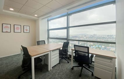 Modern coworking space with city views and ergonomic seating on Turbhe Midc Road, Maharashtra.