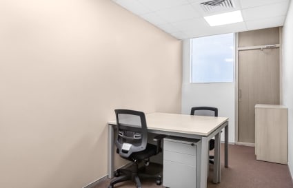 Modern coworking space with sleek furnishings and abundant natural light in South Phase.