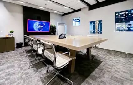 Modern coworking space in Fort Bonifacio featuring a sleek conference room with high-tech amenities.