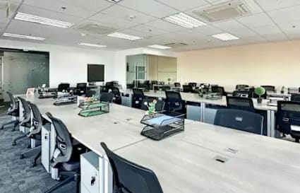 Modern coworking space in Fort Bonifacio with spacious desks and ergonomic chairs.