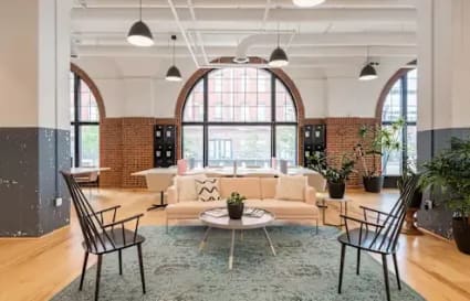 Bright coworking space in Taguig with modern furnishings and abundant natural light.