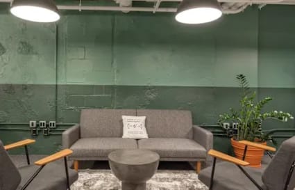 Cozy coworking lounge with modern seating and ambient lighting in Western Bicutan.