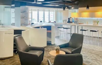 Modern coworking space in Cebu with stylish seating and natural light for collaboration.