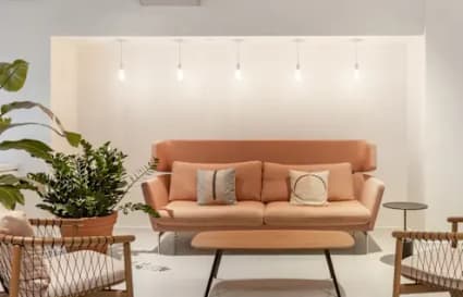 Modern coworking lounge in Chennai with stylish seating and warm lighting. Perfect for collaboration.