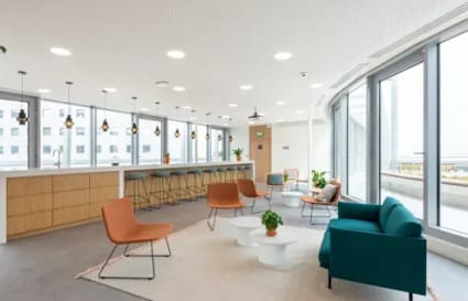 Bright coworking space with stylish seating, natural light, and a welcoming atmosphere on GS Road.