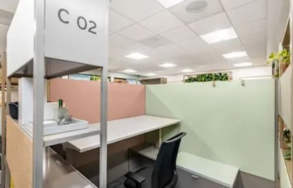 Modern coworking cubicle in Amritsar with bright lighting and cozy privacy, ideal for productivity.