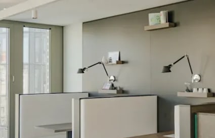 Modern coworking space in Kondapur with stylish booths and ample natural light.