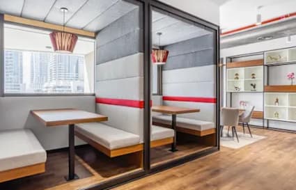 Modern coworking space in Zirakpur with cozy booths and elegant meeting areas.