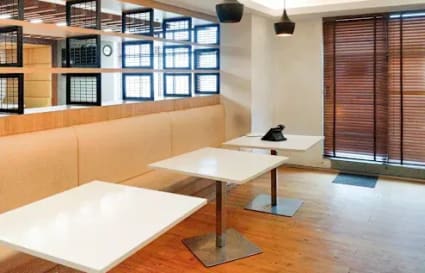 Modern coworking space with natural light, stylish seating, and a collaborative atmosphere in Gomti Nagar.