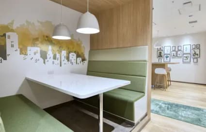 Chic coworking nook with modern decor and cozy seating in vibrant Khlong Toei.