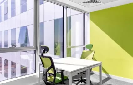 Bright, modern coworking space with natural light and vibrant accents in Aurangabad.