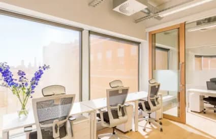 Bright, airy coworking space with ergonomic chairs and natural light on Cecil Street.