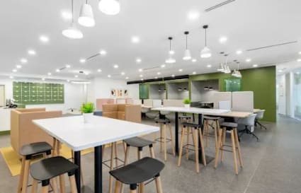 Stylish coworking space with modern furnishings and ample natural light on Cecil Street, Singapore.