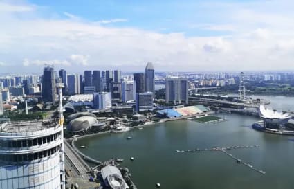 Stunning cityscape views from a flexible coworking space in Collyer Quay, Singapore.