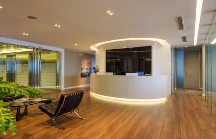 Sleek reception area with modern decor in a flexible coworking space on Ayala Avenue.
