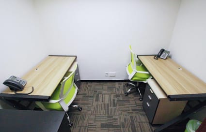 Modern serviced office in Tsim Sha Tsui with ergonomic chairs and phone-ready workstations.