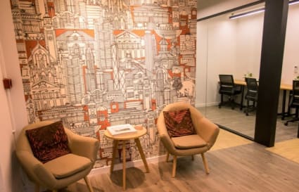 Modern coworking lounge with stylish decor and comfortable seating on Wong Chuk Hang Road.