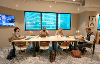 Bright coworking space in Raffles Place with modern design and city views. Perfect for collaboration.