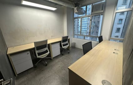 Bright coworking space with modern desks and ergonomic chairs on Watson Road, Hong Kong Island.