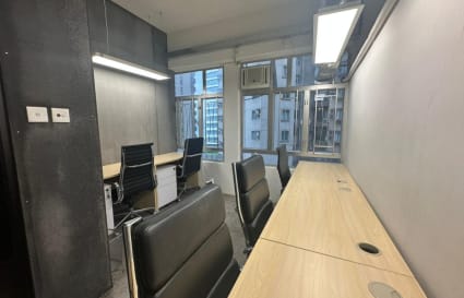 Bright coworking space with modern desks and ergonomic chairs on Watson Road, Hong Kong Island.