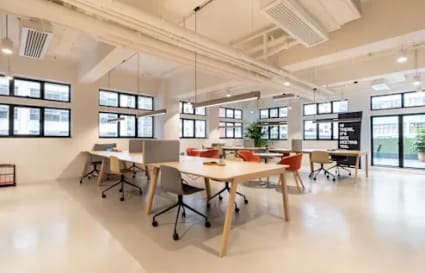 Modern coworking space in Downtown Dubai, featuring open layout and abundant natural light.