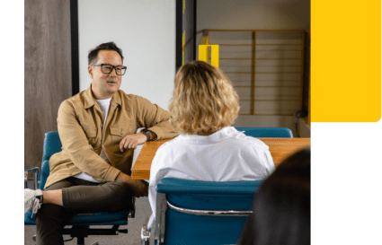 Modern coworking space with natural light and sleek, comfortable seating in Queen's Road West.