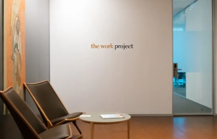 Stylish lounge area with modern seating and artwork in Singapore's flexible coworking space.