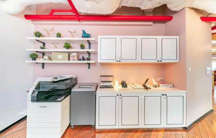 Modern coworking amenities with storage, decor, and printing facilities. Perfect for productivity.