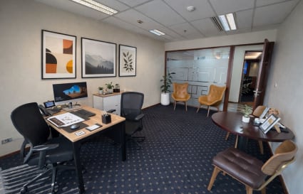 Stylish coworking space with modern decor and ample seating in Pathumwan. Ideal for productivity.