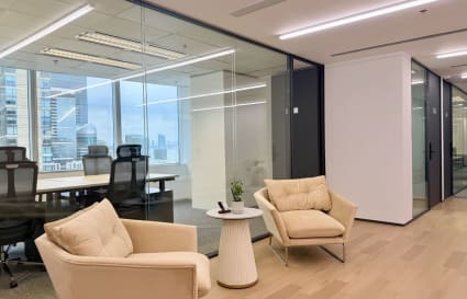 Bright coworking space in Taikoo Shing with sleek seating and panoramic views.