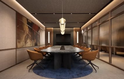 Elegant conference room with sleek table, comfortable chairs, and stylish lighting. Perfect for meetings.