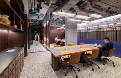 Modern Singapore coworking with open seating and sleek design for productivity and collaboration.