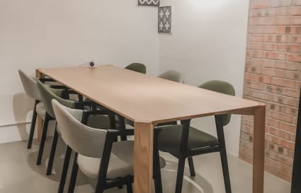 Sleek coworking space in Wan Chai with modern decor and ample seating for collaboration.