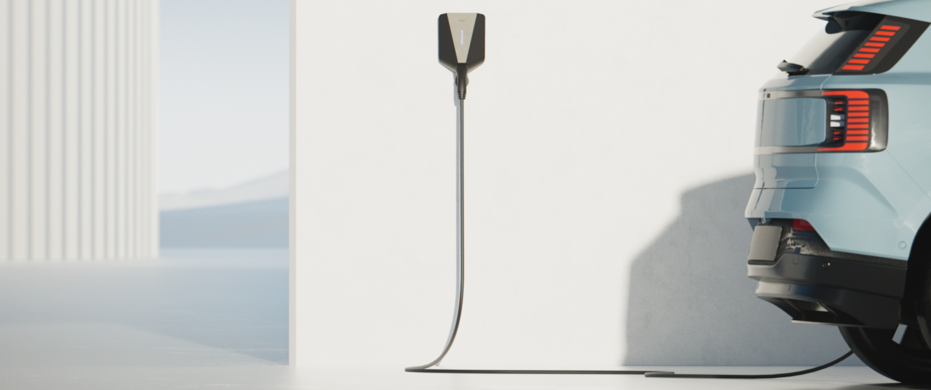 Et par som står og lader bilen, med Easee Lite elbillader montert på vegg