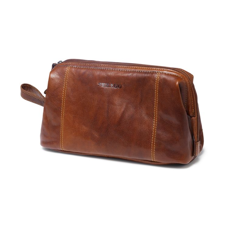 Leather wash bag fra sebago i brunt skinn. produktbilde