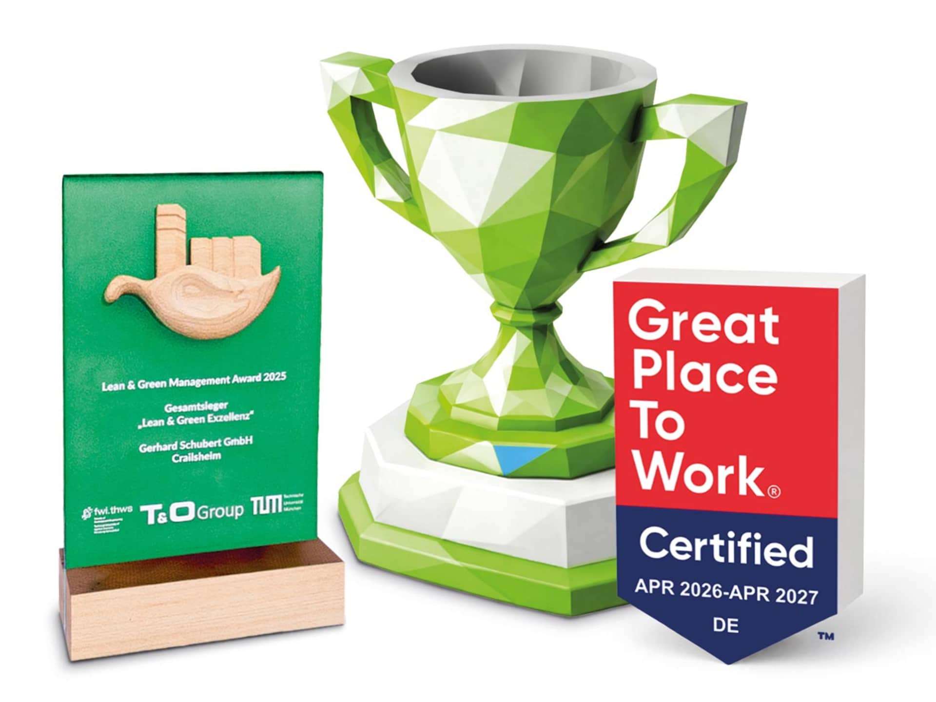 Stylised trophy made of green and white cardboard pieces, alongside a Lean & Green Management Award and the “Great Place to Work Certified” seal.