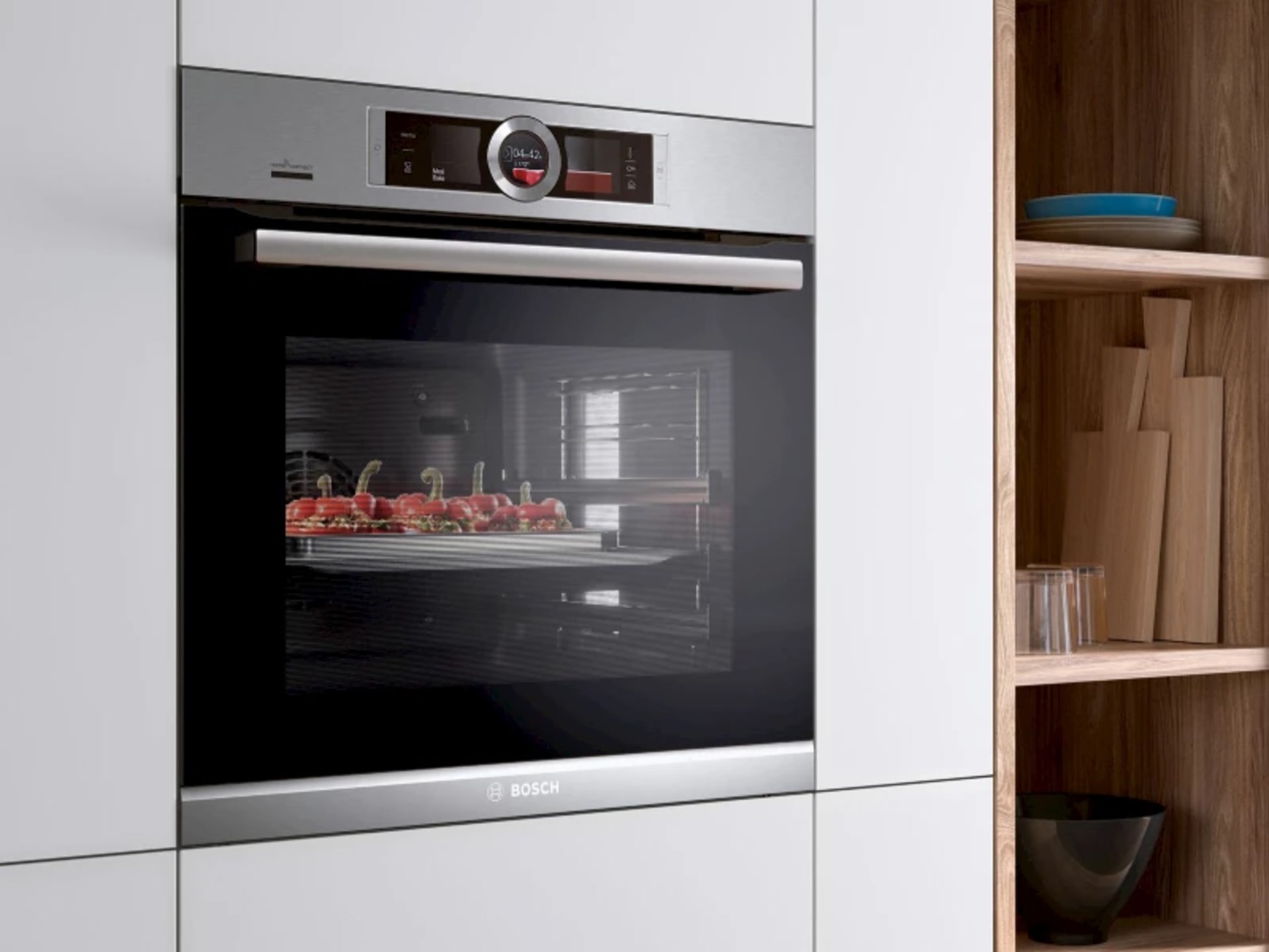 Moderne keuken met slimme apparatuur en touchscreen