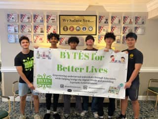Bytes for Better Lives volunteers helping the community